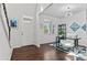 Modern office with hardwood floors, a large window, contemporary decor, and ample workspace at 20529 E Brunswick Pl, Aurora, CO 80013