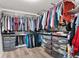 Organized walk-in closet with shelving and drawers, offering ample storage and easy access to clothing at 20529 E Brunswick Pl, Aurora, CO 80013