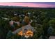 Luxury home at dusk with mountain views at 2230 E Grand Ave, Cherry Hills Village, CO 80113