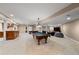 Finished basement with a pool table, bar, and entertainment area for recreation and social gatherings at 2230 E Grand Ave, Cherry Hills Village, CO 80113