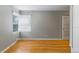 Bedroom featuring hardwood floors, neutral paint, and a bright window at 2640 S Marion St # 2646, Denver, CO 80210