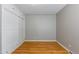 This bedroom offers hardwood floors and neutral paint at 2640 S Marion St # 2646, Denver, CO 80210