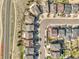 An aerial view looking down on a suburban neighborhood, showcasing neatly arranged houses at 3266 Riverwood Way, Castle Rock, CO 80109