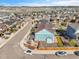 Aerial view of two story home with yard at 3266 Riverwood Way, Castle Rock, CO 80109