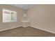 Bedroom with neutral walls, carpet, and window letting in light at 3266 Riverwood Way, Castle Rock, CO 80109