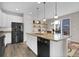 Kitchen with granite island, stainless appliances, and a breakfast nook at 3266 Riverwood Way, Castle Rock, CO 80109