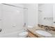 Bathroom featuring a shower/tub combo, single sink vanity and modern fixtures at 9905 Aftonwood St, Highlands Ranch, CO 80126