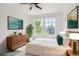Stylishly decorated bedroom with plenty of natural light at 9905 Aftonwood St, Highlands Ranch, CO 80126