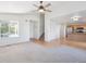 Bright living room with hardwood floors and an open layout at 9905 Aftonwood St, Highlands Ranch, CO 80126