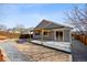 Cozy backyard with a patio, wooden pergola, and privacy fence at 16351 E 104Th Pl, Commerce City, CO 80022