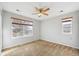 Bright bedroom with natural light features a ceiling fan and plush carpeting at 16351 E 104Th Pl, Commerce City, CO 80022