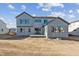 Two-story house with backyard and patio at 1750 Marlowe W Cir, Erie, CO 80516