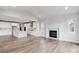 Open concept kitchen with island and white cabinets at 1750 Marlowe W Cir, Erie, CO 80516