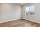 Bright study room with hardwood floors and large window at 1750 Marlowe W Cir, Erie, CO 80516