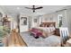 Bright and cozy bedroom featuring a large bed, rug, and neutral color scheme, creating a relaxing ambiance at 8829 Animas River St, Littleton, CO 80125