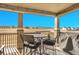 Covered patio with views and patio furniture for relaxation at 8829 Animas River St, Littleton, CO 80125