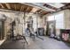 Basement gym features workout equipment at 23427 Song Bird Hills Pl, Parker, CO 80138