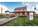 Charming local coffee shop with a welcoming front porch and outdoor seating at 23427 Song Bird Hills Pl, Parker, CO 80138