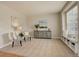 Cozy living room featuring neutral colors, plush carpet, and a comfortable window seat for relaxation at 23427 Song Bird Hills Pl, Parker, CO 80138