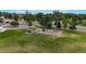 Community playground area with green space and seating at 23427 Song Bird Hills Pl, Parker, CO 80138