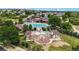 Fun community splash pad area surrounded by lush landscaping and covered seating at 23427 Song Bird Hills Pl, Parker, CO 80138