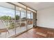 Enclosed patio with tile floors and sliding glass doors, perfect for relaxing or entertaining at 2196 W 56Th Ave, Denver, CO 80221