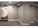 Finished basement area with carpet and an open doorway, ready for customization and comfortable living at 285 E Dartmouth Ave, Englewood, CO 80113