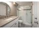 Bright bath featuring a walk-in shower, modern vanity, and fresh updates for a relaxing retreat at 285 E Dartmouth Ave, Englewood, CO 80113