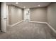 Bedroom with carpet and fresh paint provides access to a bright bath and a spacious closet at 285 E Dartmouth Ave, Englewood, CO 80113