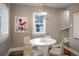 Dining room featuring hardwood floors and plenty of natural light at 285 E Dartmouth Ave, Englewood, CO 80113