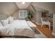 Main bedroom featuring hardwood floors and a workspace at 285 E Dartmouth Ave, Englewood, CO 80113