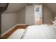 Main bedroom with hardwood floors and an ensuite bathroom at 285 E Dartmouth Ave, Englewood, CO 80113