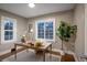 Office space with hardwood floors and a large window at 285 E Dartmouth Ave, Englewood, CO 80113