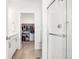 Modern bathroom featuring a glass shower, granite vanity and walk-in closet at 7414 E 158Th Pl, Thornton, CO 80602