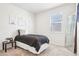 Well-lit secondary bedroom with plush carpeting at 7414 E 158Th Pl, Thornton, CO 80602