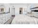 Serene main bedroom featuring a view into the walk-in closet at 7414 E 158Th Pl, Thornton, CO 80602