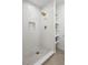 Clean shower with white subway tile and hexagon floor tile at 6877 S Franklin Cir, Centennial, CO 80122