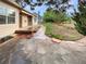 Spacious backyard featuring a stone patio and deck, perfect for outdoor entertaining at 584 W Prestwick Way, Castle Rock, CO 80104