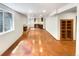 Finished basement with unique flooring, built-in shelving, and potential for customization at 584 W Prestwick Way, Castle Rock, CO 80104