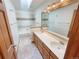Bright bathroom featuring double sinks, a tub/shower combination, and ample counter space at 584 W Prestwick Way, Castle Rock, CO 80104