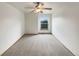 Bright bedroom with a ceiling fan and natural light from a window at 584 W Prestwick Way, Castle Rock, CO 80104