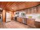 Modern kitchen with stainless steel appliances and stylish countertops and backsplash at 11080 S Deer Creek Rd, Littleton, CO 80127