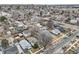 Wide aerial view of neighborhood featuring tree-lined streets and a variety of cozy homes at 3064 S Cherokee St, Englewood, CO 80110