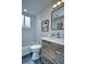 Elegant bathroom features subway tile, a modern vanity, and a well-lit mirror at 830 N Sherman St # 205, Denver, CO 80203