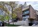 Attractive brick building with modern balconies, street access, and professional landscaping at 830 N Sherman St # 205, Denver, CO 80203