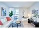 Bright living room with neutral colors, modern furniture, and balcony access at 830 N Sherman St # 205, Denver, CO 80203