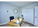Inviting office space with a wooden desk, comfortable chair, and serene decor promoting focus at 830 N Sherman St # 205, Denver, CO 80203