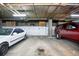 Spacious parking garage with secure storage for two vehicles in a well-lit area at 830 N Sherman St # 205, Denver, CO 80203