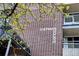Close up view of Sherman Square signage on exterior brick wall at 830 N Sherman St # 205, Denver, CO 80203