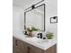 Well-lit bathroom featuring a double sink vanity and modern fixtures, perfect for contemporary living at 2293 S Sherman St, Denver, CO 80210